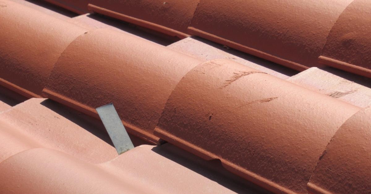 Tile roof with hail damage